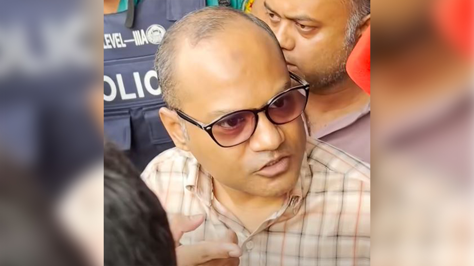 পুলিশের সঙ্গে বাগ্‌বিতণ্ডায় জড়ানো ব্যক্তি সময় টেলিভিশনের কেউ নন