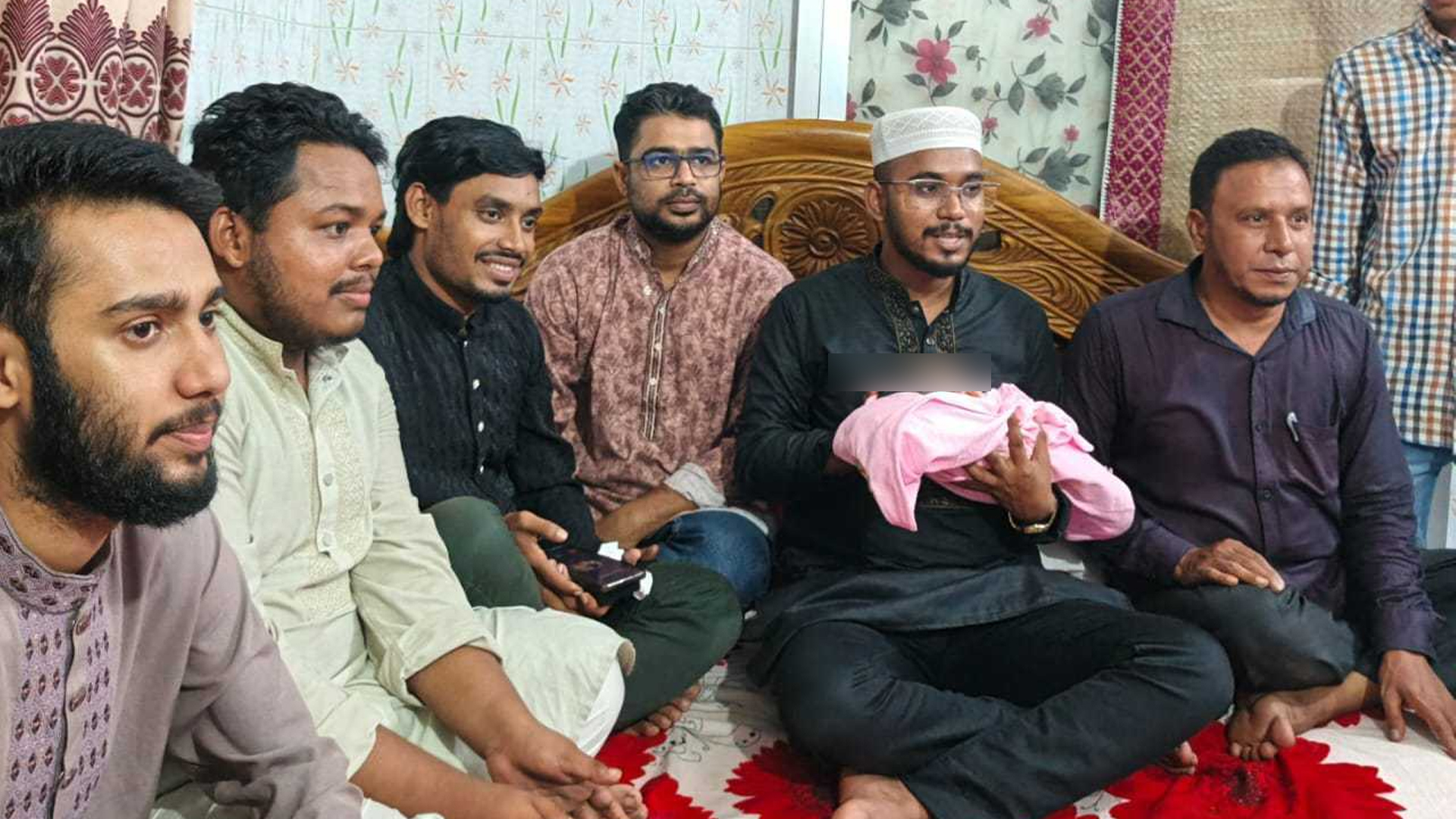 শহীদ মাহমুদুলের সদ্য ভূমিষ্ট বোনকে দেখতে গেলেন হান্নান মাসউদ